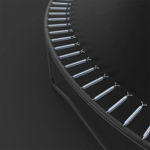 Metallic fishing hooks arranged in a circular pattern on a black background