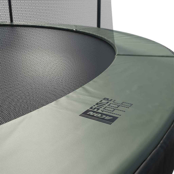 Close-up of a trampoline with a visible brand logo