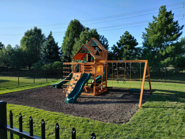 Nice Wooden Swing Set in Backyard