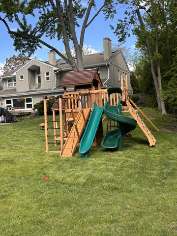 Backyard Adventures cedar play set installed by Fenceworks in the Chicago area