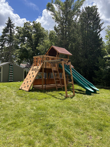 Backyard Adventures cedar play set installed by Fenceworks in the Chicago area