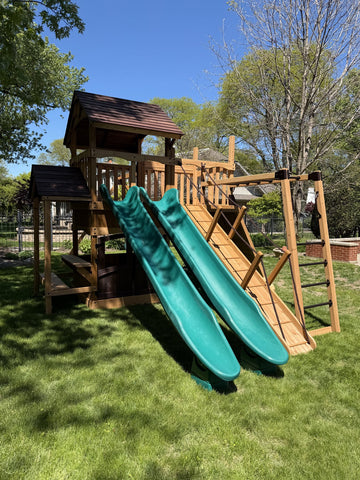 Backyard Adventures cedar play set installed by Fenceworks in the Chicago area