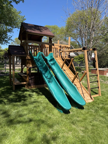 Backyard Adventures cedar play set installed by Fenceworks in the Chicago area