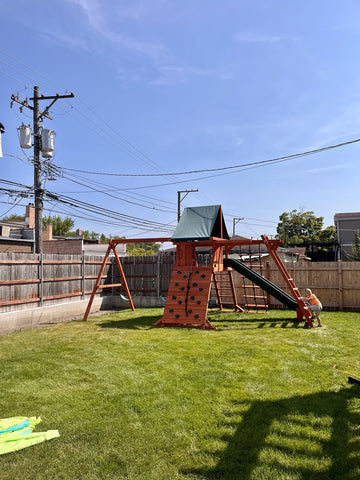 Playground One cedar play set installed by Fenceworks in the Chicago area