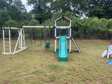 Adventure World vinyl play set installed by Fenceworks in Georgia