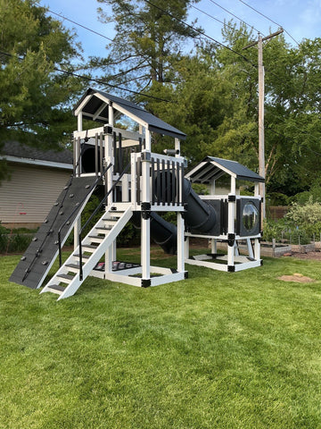 Adventure World vinyl play set installed by Fenceworks in Libertyville, IL