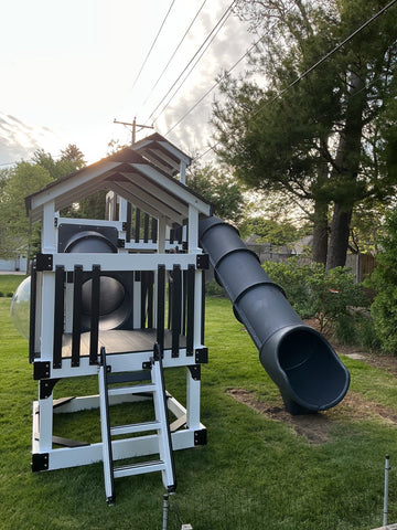 Adventure World vinyl play set installed by Fenceworks in Libertyville, IL