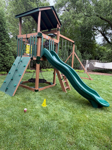 Adventure World vinyl play set installed by Fenceworks in Northbrook, IL