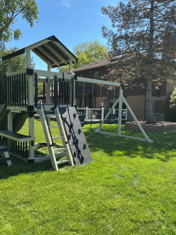 Adventure World vinyl play set installed by Fenceworks in Northbrook, IL