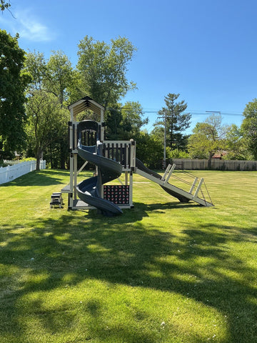 Adventure World vinyl play set installed by Fenceworks in Northfield, IL