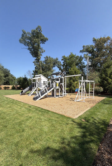 Adventure World vinyl play set installed by Fenceworks in Northfield, IL