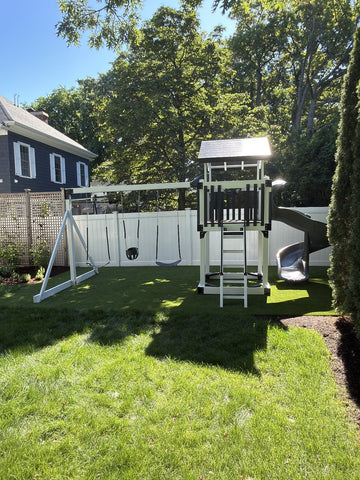 Adventure World vinyl play set installed by Fenceworks in Winnetka, IL