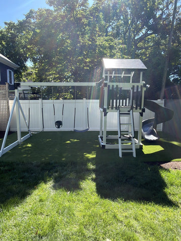 Adventure World vinyl play set installed by Fenceworks in Winnetka, IL